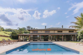 Casa em condomínio com piscina em Amparo